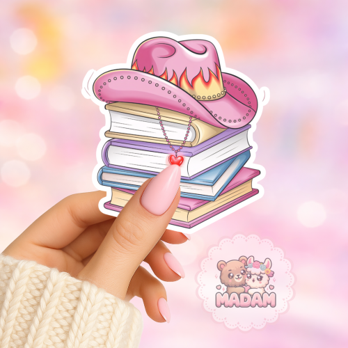 Naklejka foliowa stos książek z kapeluszem MaDam Creative